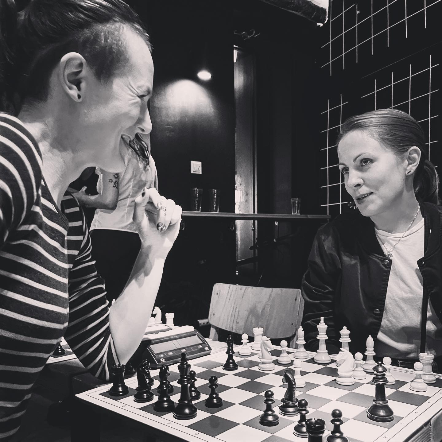 Two women playing chess